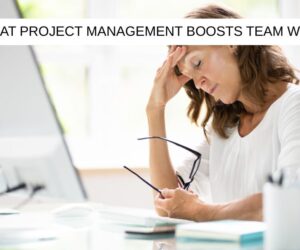 Woman looking stressed at her desk